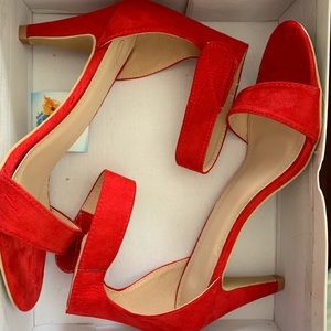 J Adams red heels